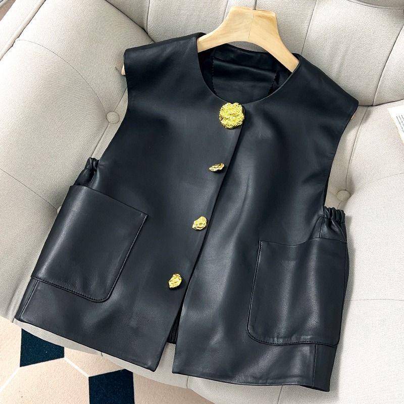 Black Sleeveless Jacket With Large Gold Buttons