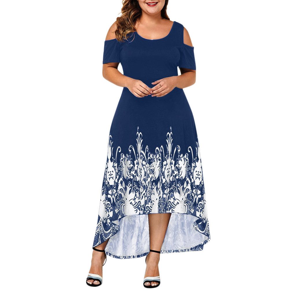 Front view on a model: Bring some serious style to your wardrobe with our Women's Plus Size High-Low Midi Dress. The elaborate design at the base gives this dress a unique touch, while the round neckline and cut out at shoulders add to its chic and playful vibe. Perfect for any occasion, this dress will become your new favorite go-to!