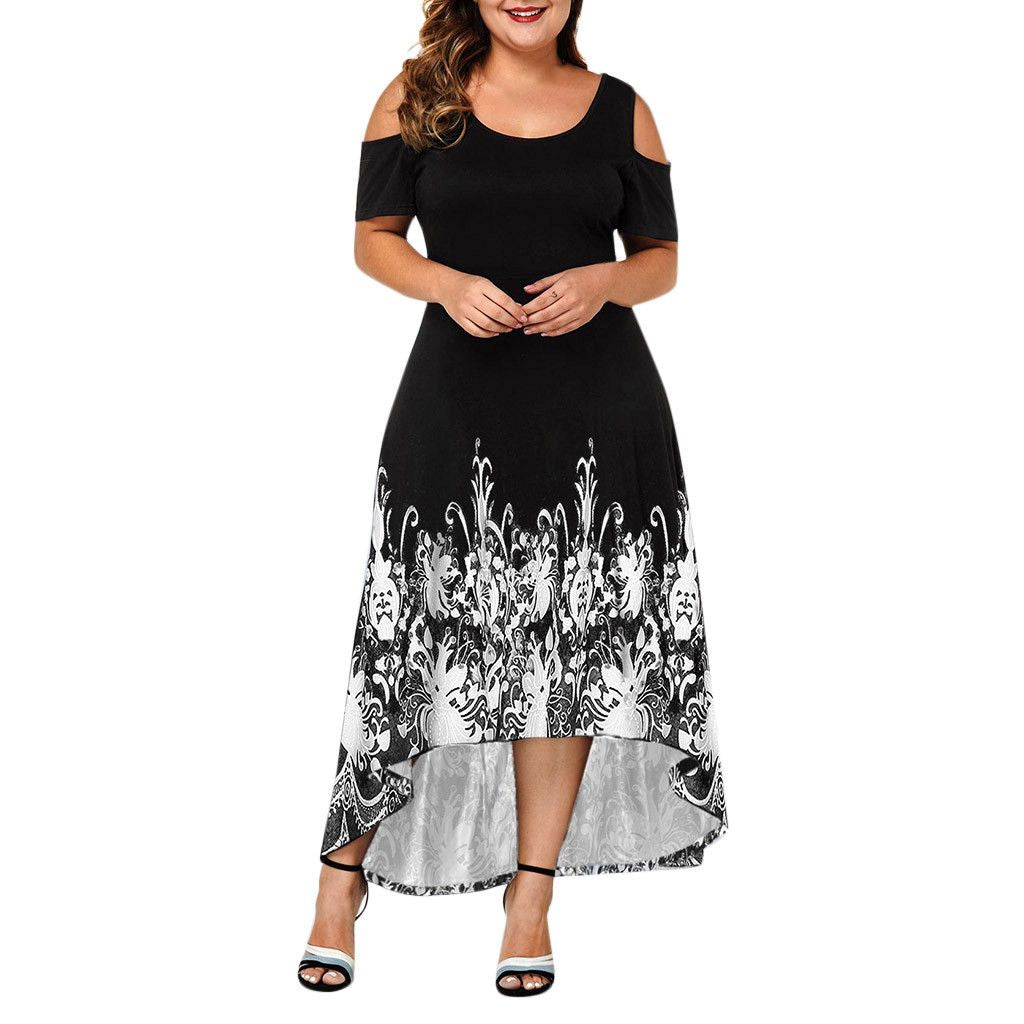 Front view on a model: Bring some serious style to your wardrobe with our Women's Plus Size High-Low Midi Dress. The elaborate design at the base gives this dress a unique touch, while the round neckline and cut out at shoulders add to its chic and playful vibe. Perfect for any occasion, this dress will become your new favorite go-to!