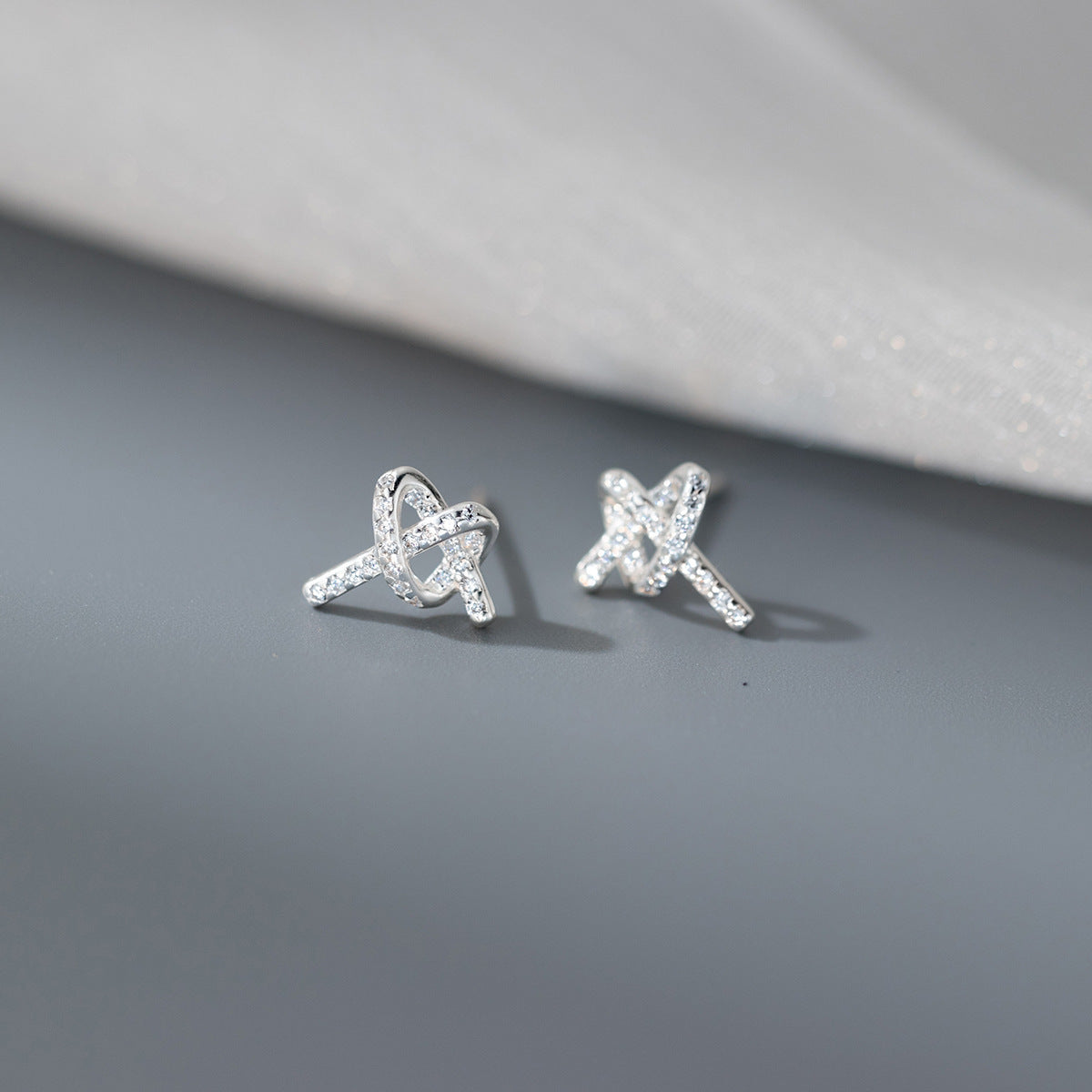 Delicate Bead-set Diamond Bends And Hitches Ear Studs