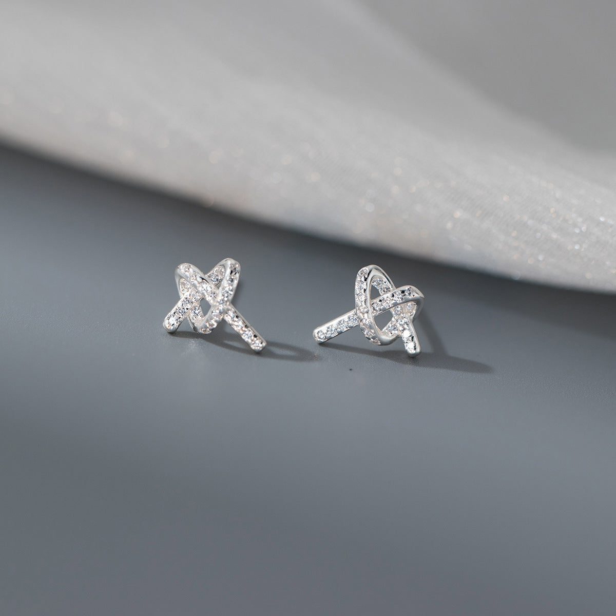 Delicate Bead-set Diamond Bends And Hitches Ear Studs